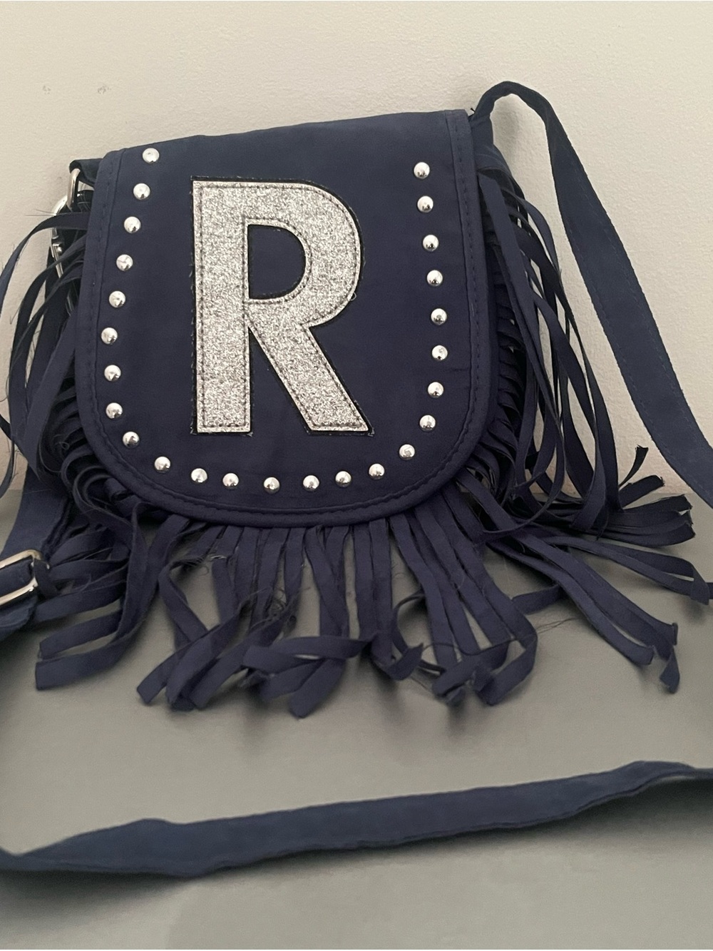 Justice Navy Fringe Crossbody with Silver R Patch